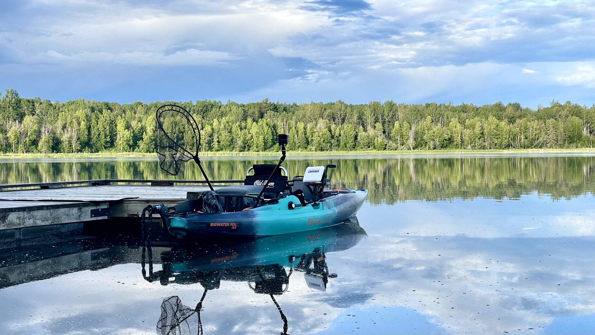 Kayak sitting at dock ready to fish.